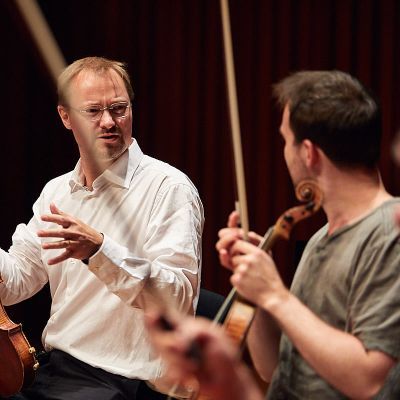 Viola teacher and student perform side by side